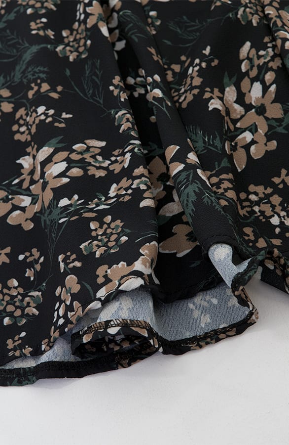 Wikkeljurk Bloemen Floor Zwart – shoparchief — foto 2
