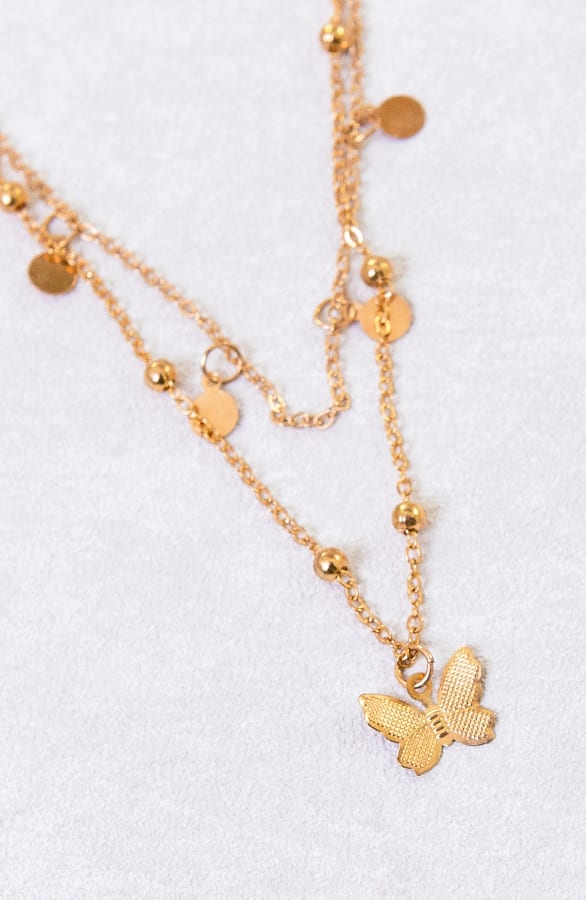 Laagjes Ketting Met Vlinder Denna Goud – shoparchief — foto 2