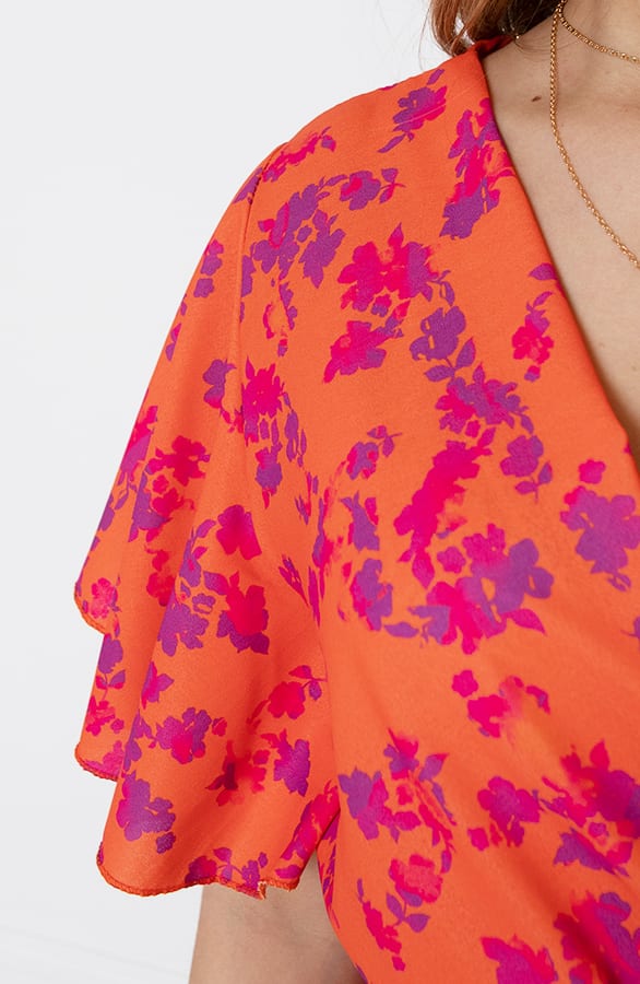 Bloemenprint Jurk Nikkie Oranje Paars – alle jurkjes — foto 13